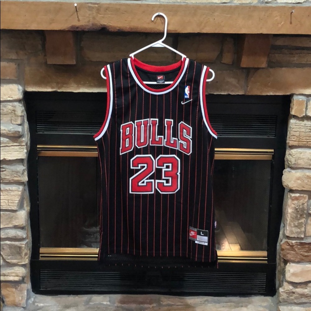 Michael Jordan black pinstripe jersey.